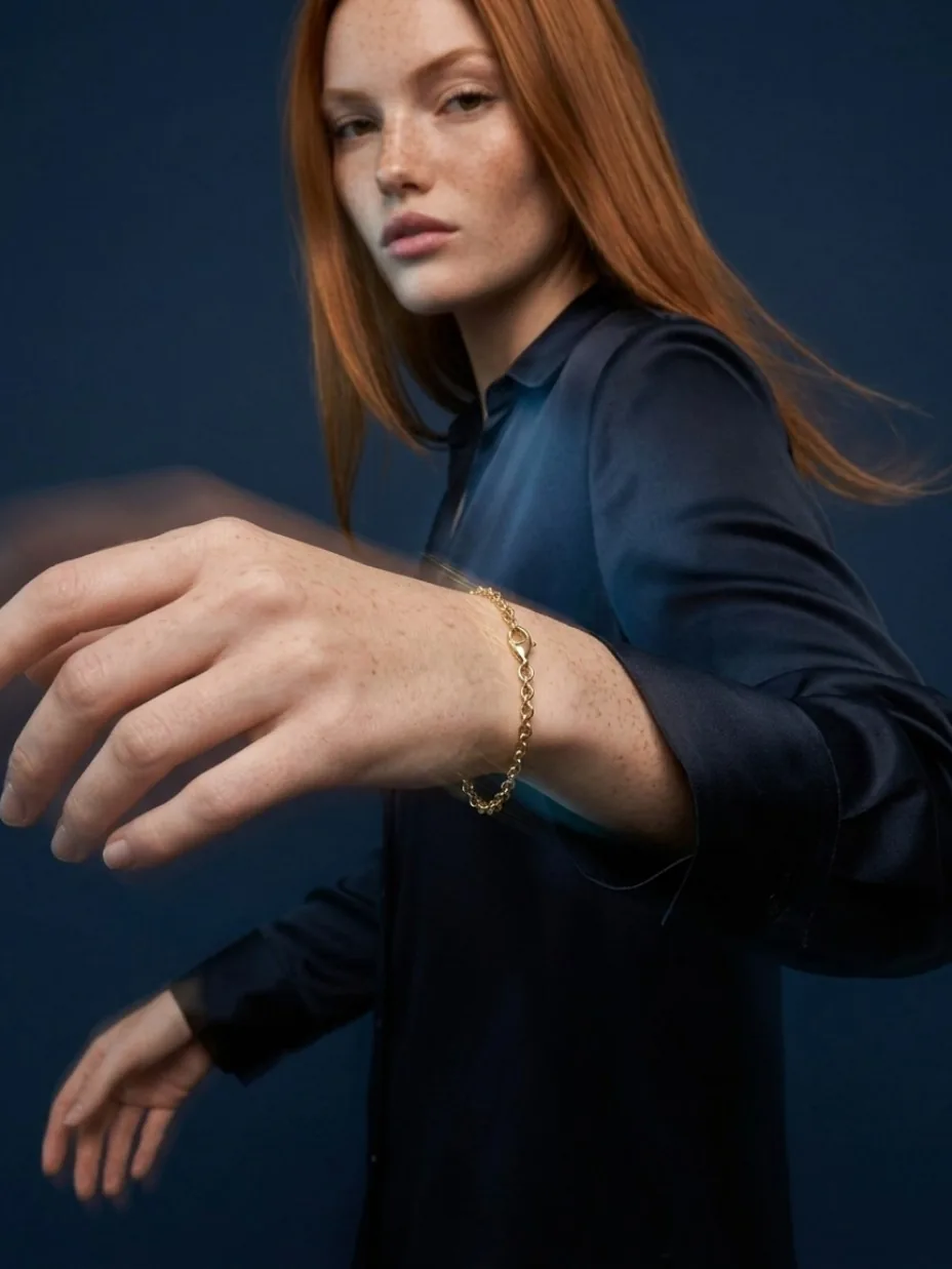 Jewelry worn in an editorial scene with movement